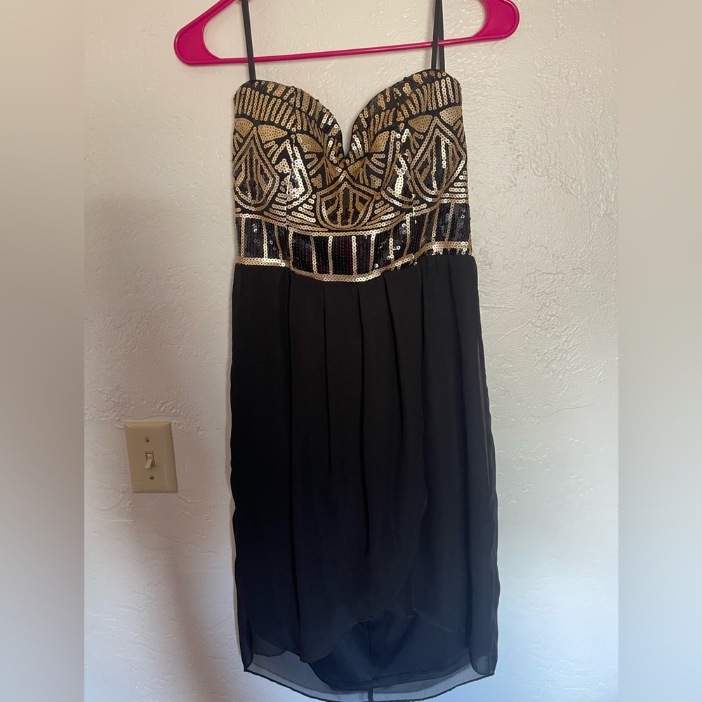 Black and gold sequin dress